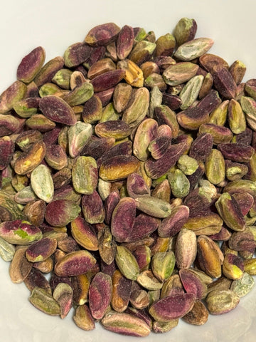 A white bowl of raw, shelled pistachio kernels from Afghanistan — Ghafori Foods