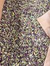 Raw Afghan pistachio kernels (pista giri) with natural purple and green skins, in a paper sack — Ghafori Foods