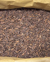 Bulk Afghan chilgoza pine nuts in a kraft sack, new-crop wholesale quantity